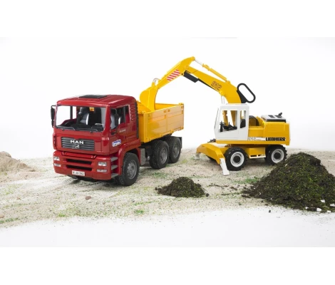 Bruder Camión MAN TGA Con Pala Excavadora Liebherr